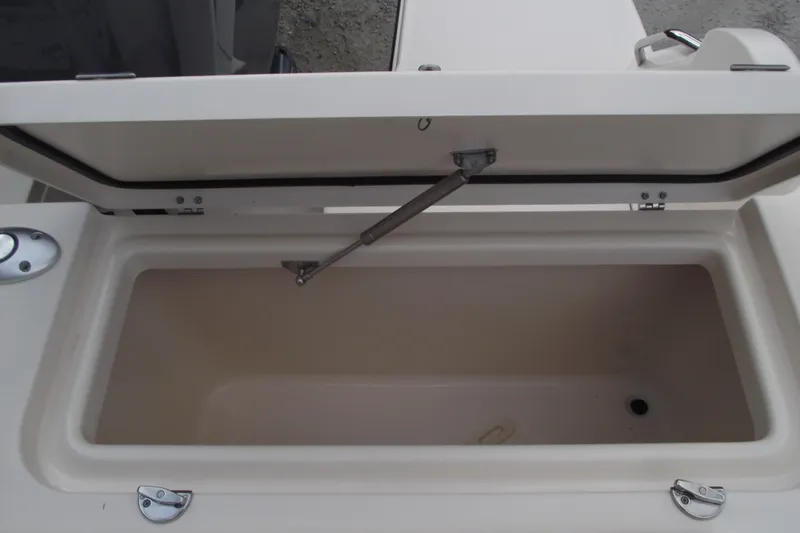 Slide: The Image of Open storage compartment on 2023 Grady-White Fisherman 236 boat. - 28