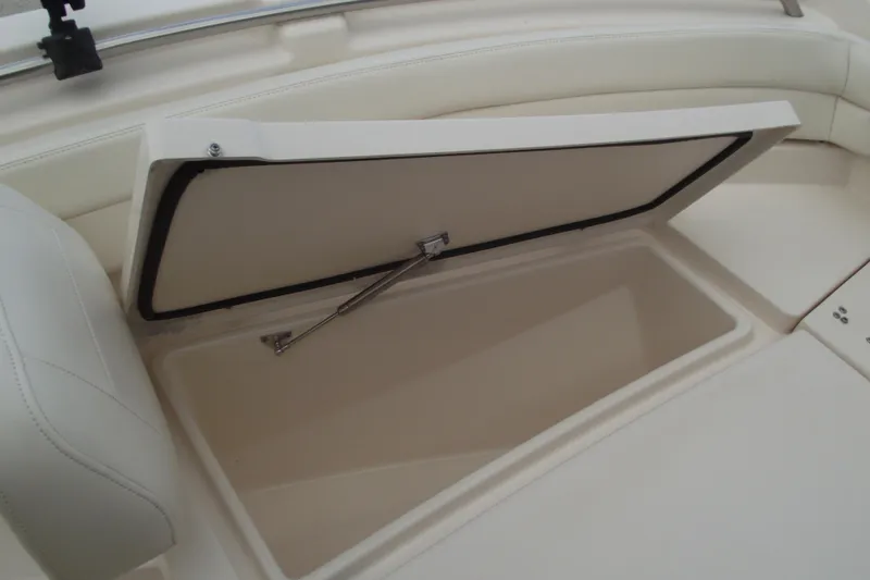 Slide: The Image of 2023 Grady-White Fisherman 236 boat storage compartment with open hatch. - 7