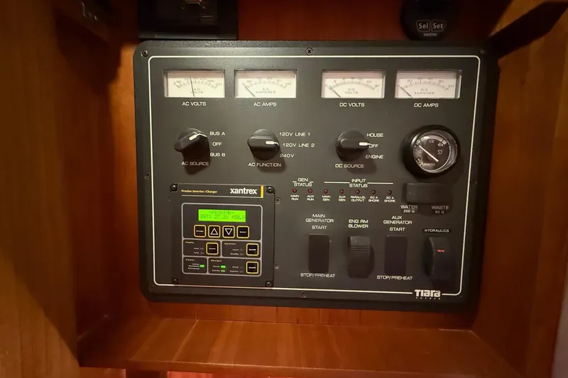 Slide: The Image of Electrical control panel on a 2001 Tiara Yachts 5200 Express boat. - 45
