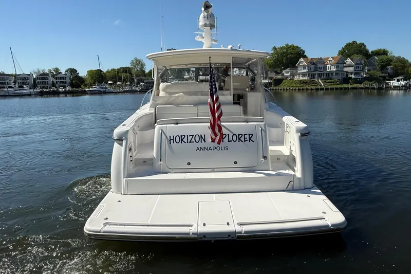 Slide: The Image of 2001 Tiara Yachts 5200 Express boat named "Horizon Explorer" in Annapolis marina. - 6