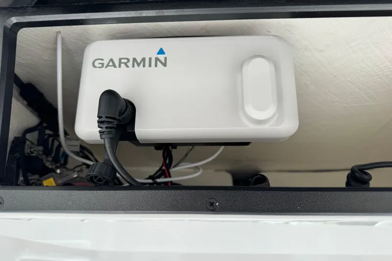 Slide: The Image of Garmin device installed in 2026 Caymas 26 HB boat, showcasing advanced marine technology. - 15