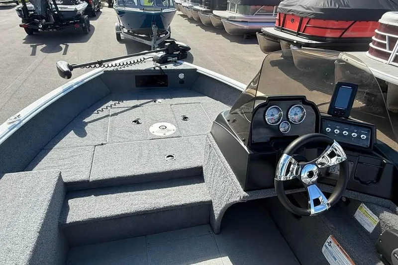 Slide: The Image of 2022 G3 Angler V164 C boat interior with steering wheel and control panel. - 5