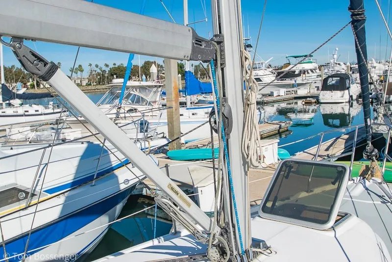 Slide: The Image of Hunter 31 sailboat from 2008 docked in a marina with other boats. - 31