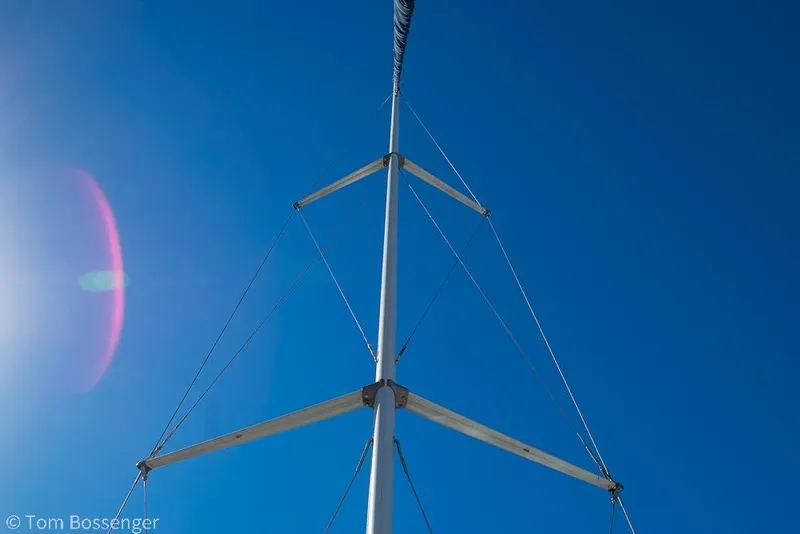 Slide: The Image of Mast of 2008 Hunter 31 sailboat against clear blue sky. - 33
