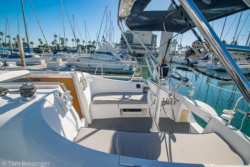 Slide: The Image of Cockpit view of a 2008 Hunter 31 sailboat docked in a marina. - 5