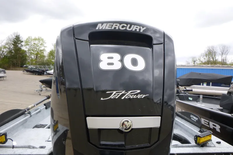 Slide: The Image of Mercury 80 JetPower engine on 2025 StealthCraft 16 StealthWeld boat, parked outdoors. - 14