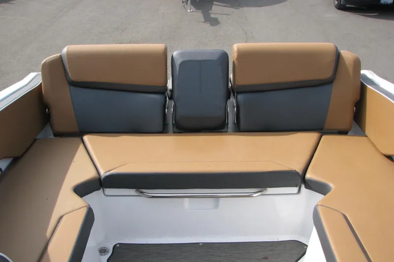 Slide: The Image of 2022 Scarab 215 ID boat interior with tan and gray seating arrangement. - 17