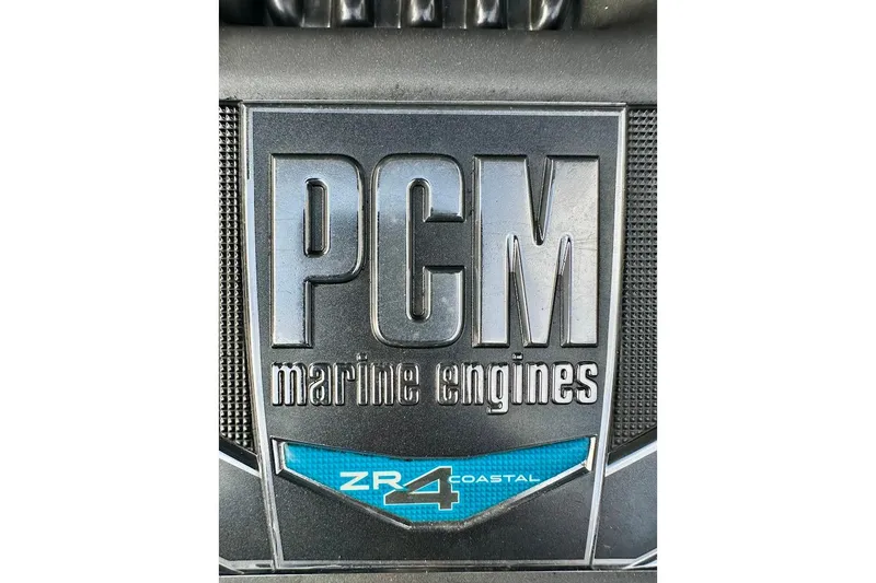 Slide: The Image of PCM Marine Engines ZR4 Coastal emblem on 2018 Nautique Super Air Nautique GS22. - 21