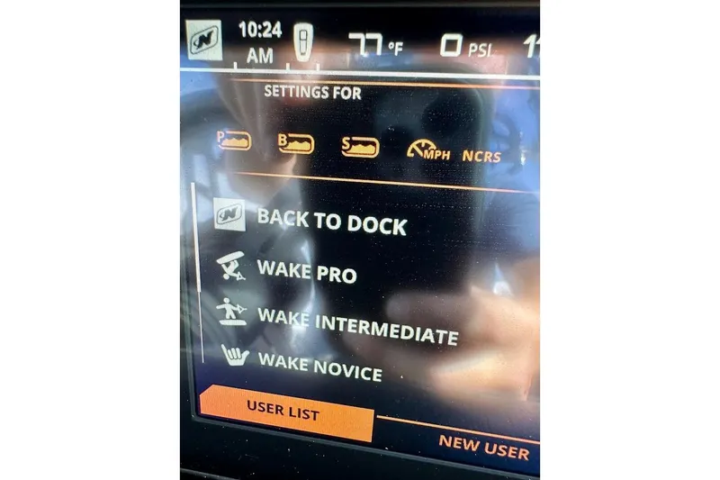 Slide: The Image of Touchscreen display of 2018 Nautique Super Air Nautique GS22 boat settings menu. - 48