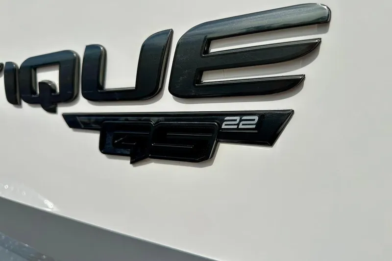 Slide: The Image of Close-up of 2018 Nautique Super Air Nautique GS22 logo on boat exterior. - 9