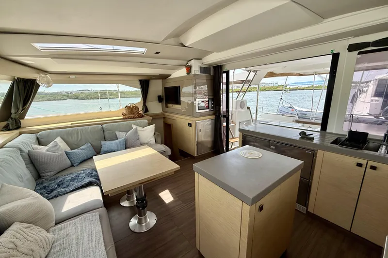 Slide: The Image of Luxurious interior of 2018 Fountaine Pajot Saona 47 catamaran with modern furnishings and scenic views. - 28