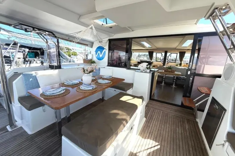 Slide: The Image of Luxurious 2018 Fountaine Pajot Saona 47 yacht interior with elegant dining area. - 3