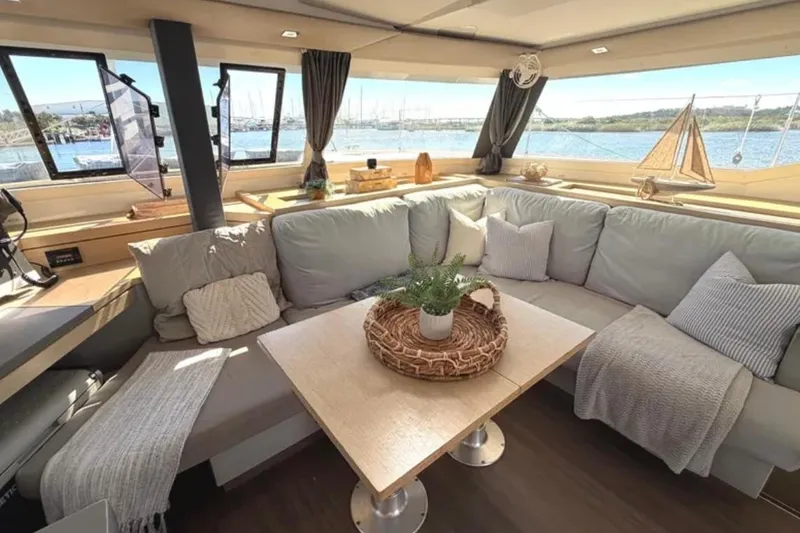 Slide: The Image of Luxurious interior of 2018 Fountaine Pajot Saona 47 catamaran with cozy seating and decor. - 30
