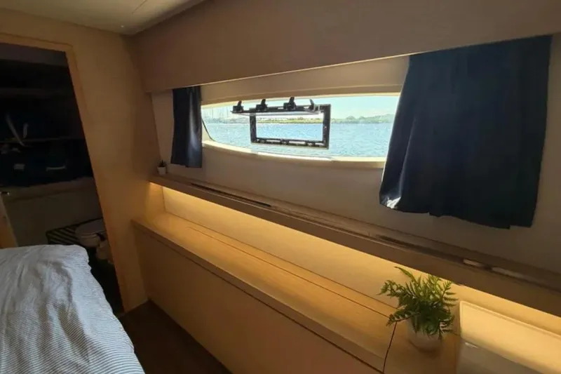 Slide: The Image of Cozy cabin interior of 2018 Fountaine Pajot Saona 47 yacht with window view. - 37