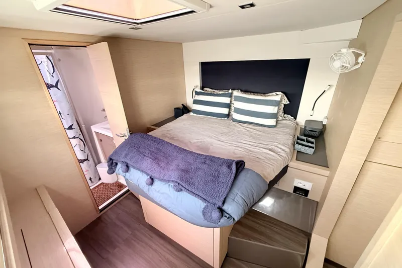 Slide: The Image of Luxurious cabin interior of 2018 Fountaine Pajot Saona 47 catamaran with cozy bed and ensuite bathroom. - 39