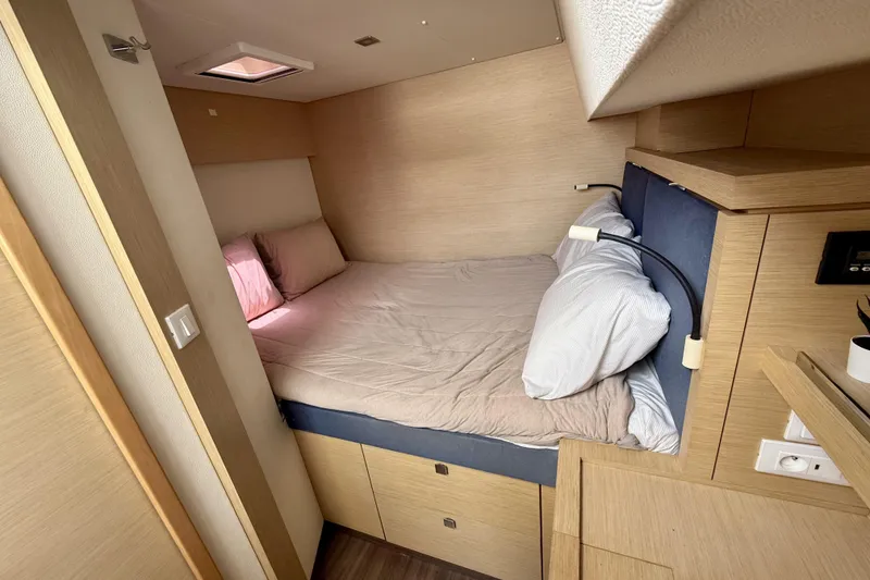 Slide: The Image of Cozy cabin interior of 2018 Fountaine Pajot Saona 47 yacht with comfortable bedding. - 47