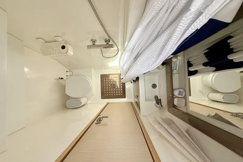 Slide: The Image of Bathroom interior of 2018 Fountaine Pajot Saona 47 catamaran, featuring modern fixtures and amenities. - 50