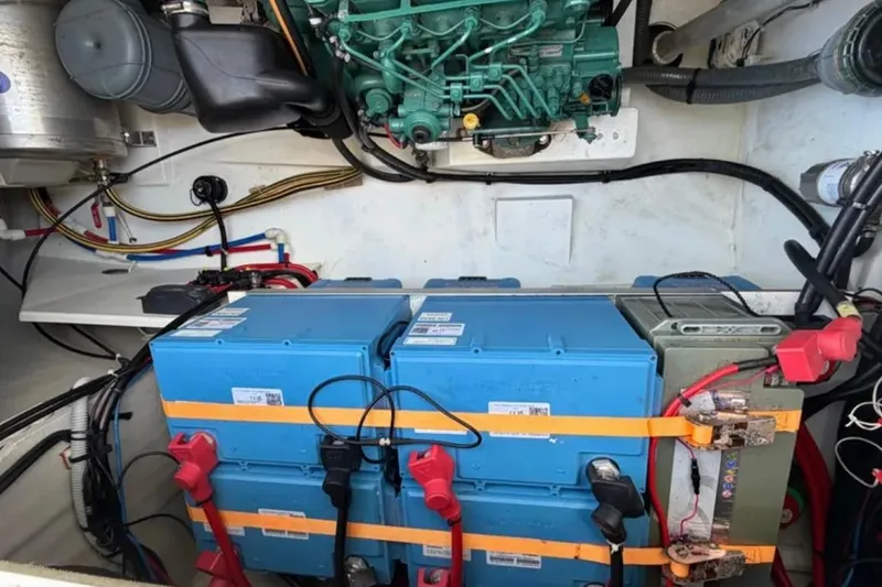 Slide: The Image of Engine room of 2018 Fountaine Pajot Saona 47 with batteries and wiring. - 54
