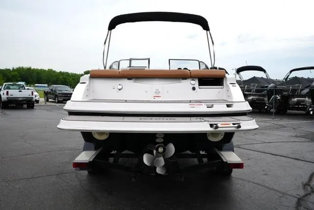 Slide: The Image of 2017 Glastron GT 245 boat rear view with propeller and swim platform. - 6