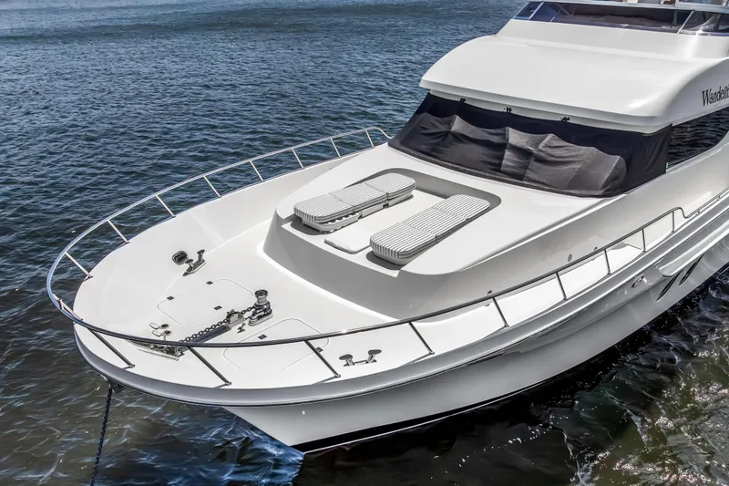 Slide: The Image of Luxury 2009 Cheoy Lee 78 yacht with spacious deck and sleek design on the water. - 10
