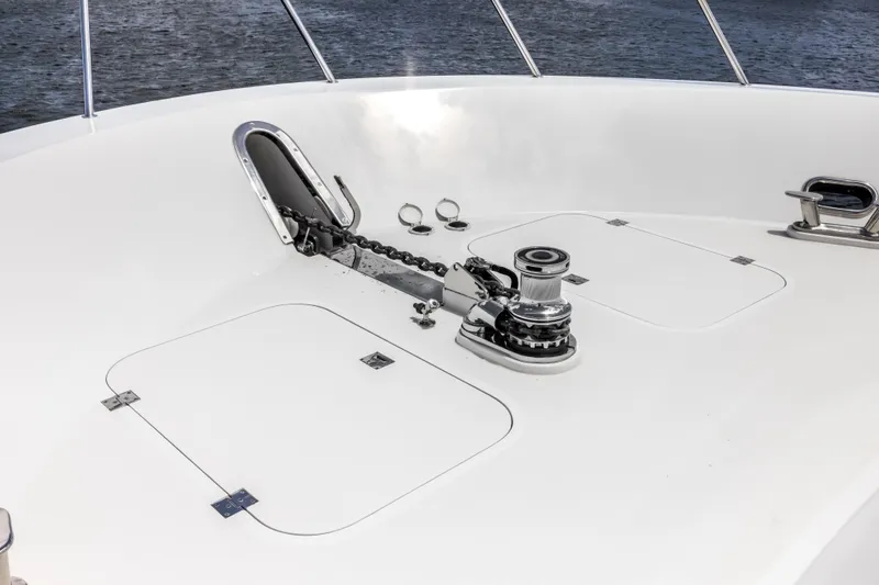 Slide: The Image of Anchor system on 2009 Cheoy Lee 78 yacht deck, featuring winch and chain. - 12