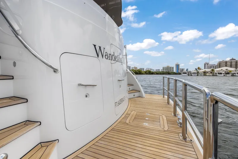 Slide: The Image of Luxury Cheoy Lee 78 yacht deck, 2009 model, with sleek design and waterfront view. - 14