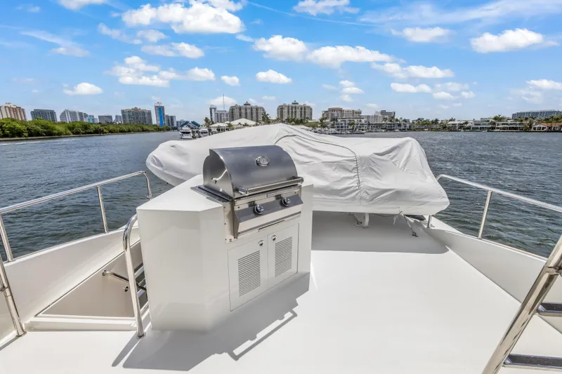 Slide: The Image of Luxury Cheoy Lee 78 yacht deck with grill, city skyline view, 2009 model. - 20