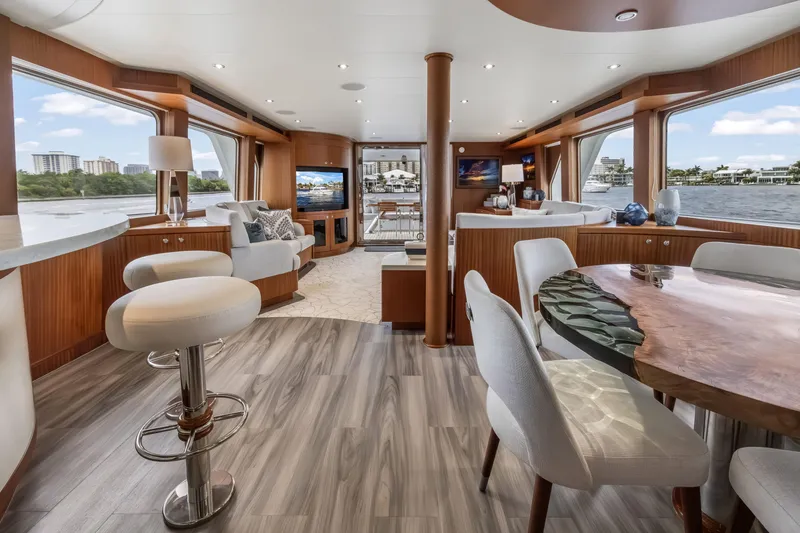 Slide: The Image of Luxurious interior of 2009 Cheoy Lee 78 yacht with elegant furnishings and panoramic windows. - 28