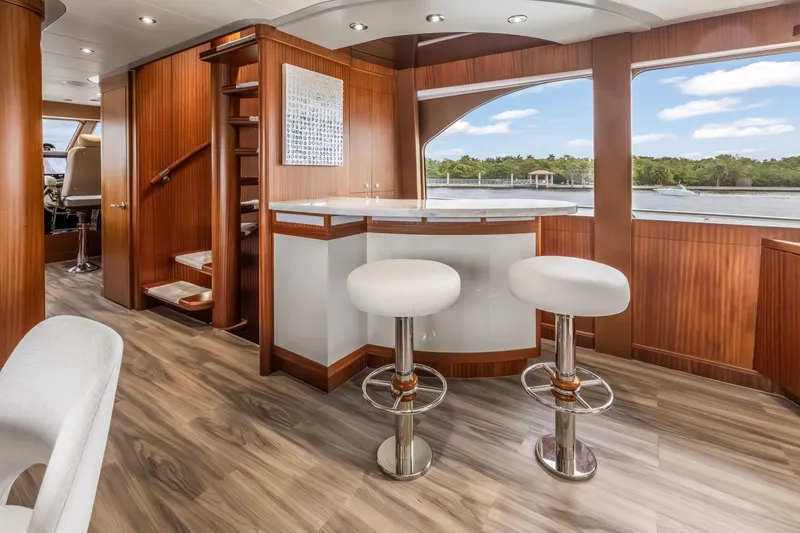 Slide: The Image of Luxurious 2009 Cheoy Lee 78 yacht interior with elegant bar and seating area. - 29