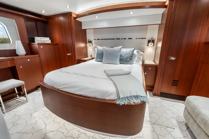 Slide: The Image of Luxurious interior of 2009 Cheoy Lee 78 yacht with modern kitchen and seating area. - 31
