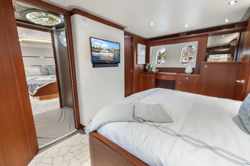 Slide: The Image of Luxurious interior of 2009 Cheoy Lee 78 yacht with modern helm and seating area. - 32
