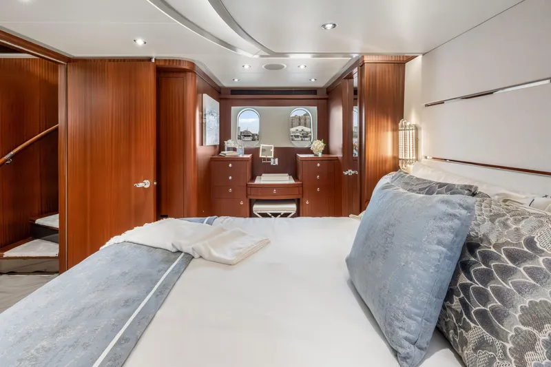 Slide: The Image of Luxurious bedroom interior of 2009 Cheoy Lee 78 yacht with elegant wood paneling. - 41