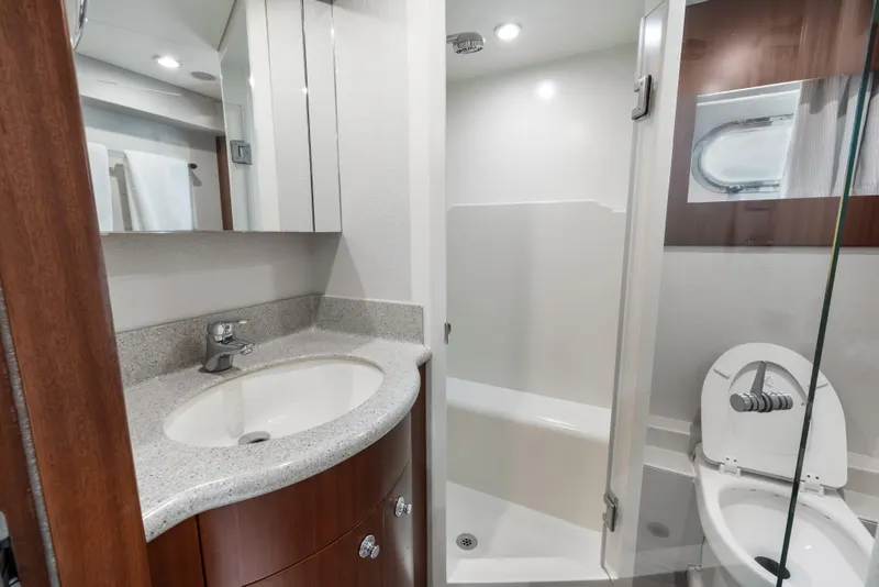 Slide: The Image of Luxurious bathroom in 2009 Cheoy Lee 78 yacht with granite countertops and modern shower. - 44
