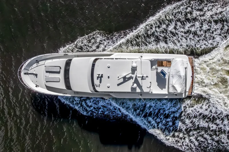 Slide: The Image of Aerial view of 2009 Cheoy Lee 78 yacht cruising on water. - 5