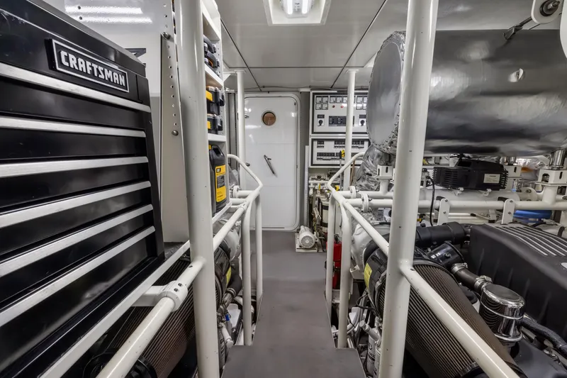 Slide: The Image of Engine room of 2009 Cheoy Lee 78 yacht, featuring machinery and equipment. - 50