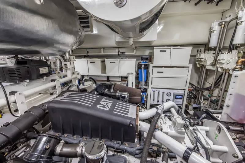 Slide: The Image of Engine room of 2009 Cheoy Lee 78 yacht with tools and machinery. - 51