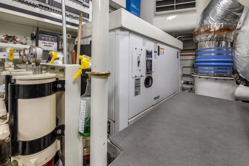 Slide: The Image of Engine room of 2009 Cheoy Lee 78 yacht with Kohler generator and equipment. - 54