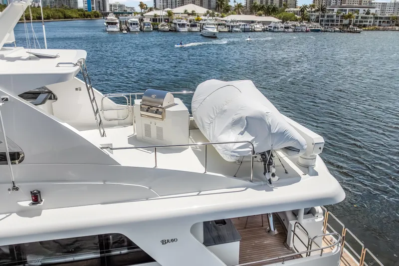 Slide: The Image of Luxury Cheoy Lee 78 yacht deck with grill, docked in marina, 2009 model. - 6