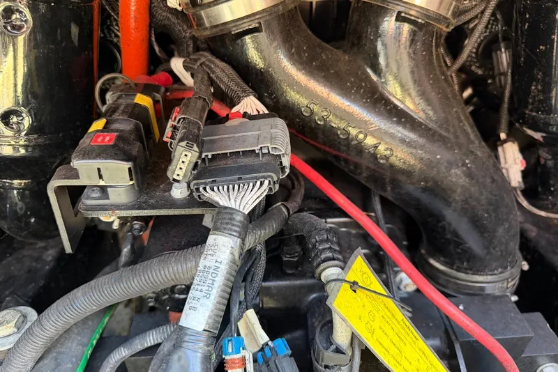 Slide: The Image of Engine components of a 2015 TomCat MB Sports Wake 22 boat. - 10