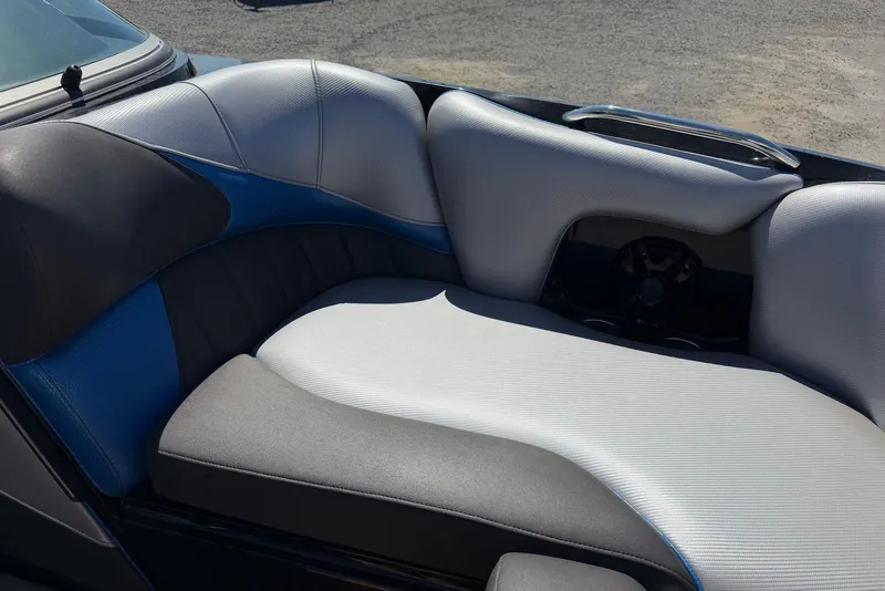 Slide: The Image of 2015 TomCat MB Sports Wake 22 boat interior with gray and blue seating. - 16