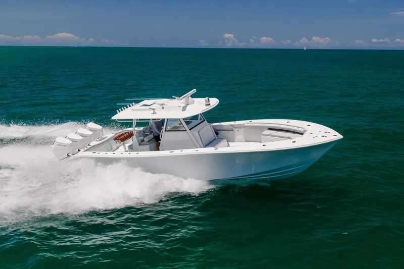 Slide: The Image of 2023 Yellowfin 39 Offshore boat cruising on open water. - 8