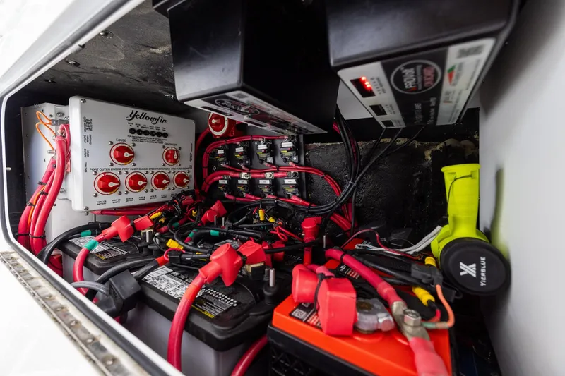 Slide: The Image of Electrical system of 2023 Yellowfin 39 Offshore boat, featuring batteries and wiring components. - 49