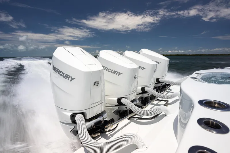 Slide: The Image of 2023 Yellowfin 39 Offshore boat with four powerful Mercury outboard engines on open water. - 40