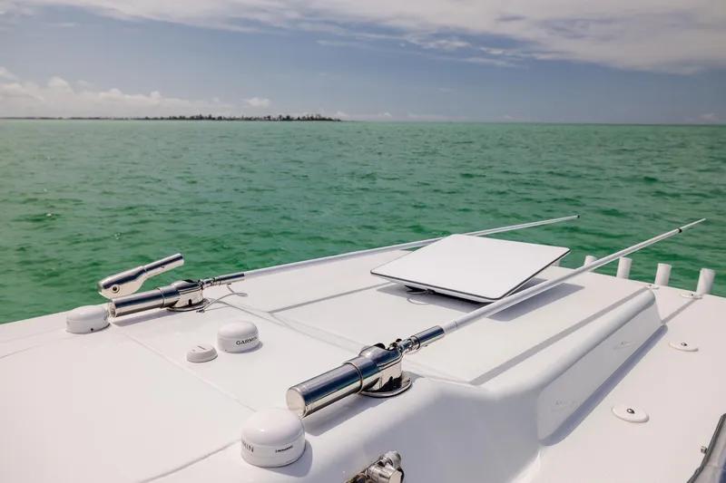 Slide: The Image of 2023 Yellowfin 39 Offshore boat with marine equipment on turquoise water. - 17