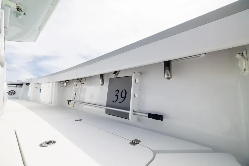 Slide: The Image of 2023 Yellowfin 39 Offshore boat interior with sleek white design and modern features. - 31