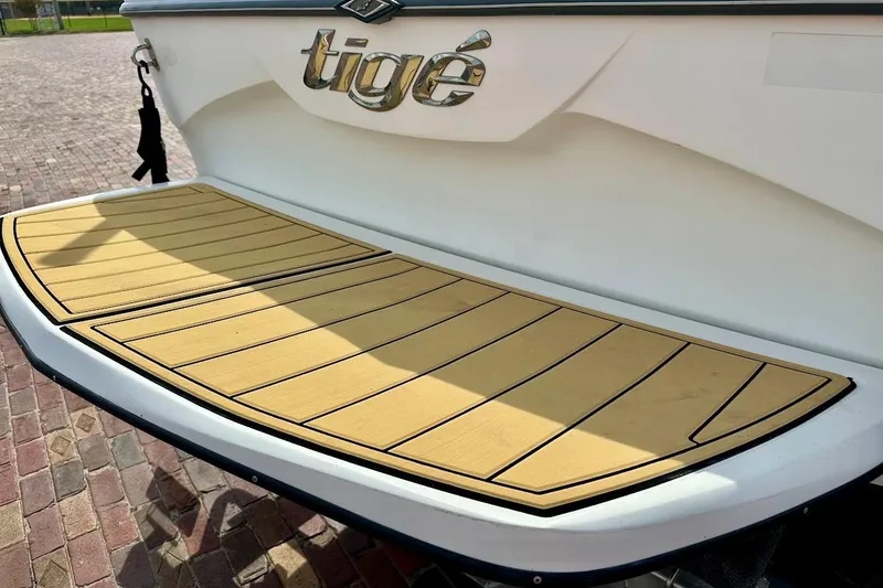 Slide: The Image of 2012 Tigé R20 boat swim platform with teak-style decking. - 31