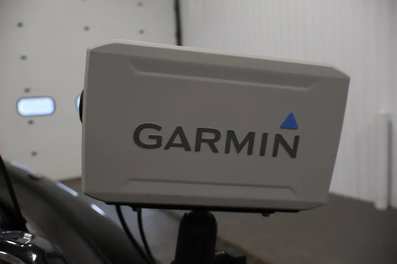 Slide: The Image of Garmin device on 2022 Tracker Pro Team 175 TXW boat, indoor setting. - 26