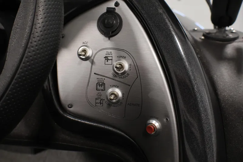 Slide: The Image of Control panel of 2022 Tracker Pro Team 175 TXW boat with switches and buttons. - 29