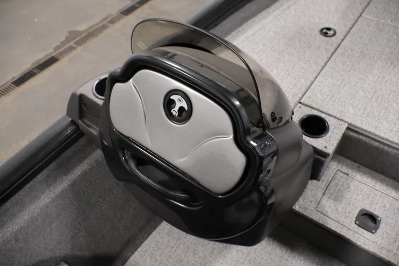 Slide: The Image of 2022 Tracker Pro Team 175 TXW boat console with steering wheel and cup holder. - 31
