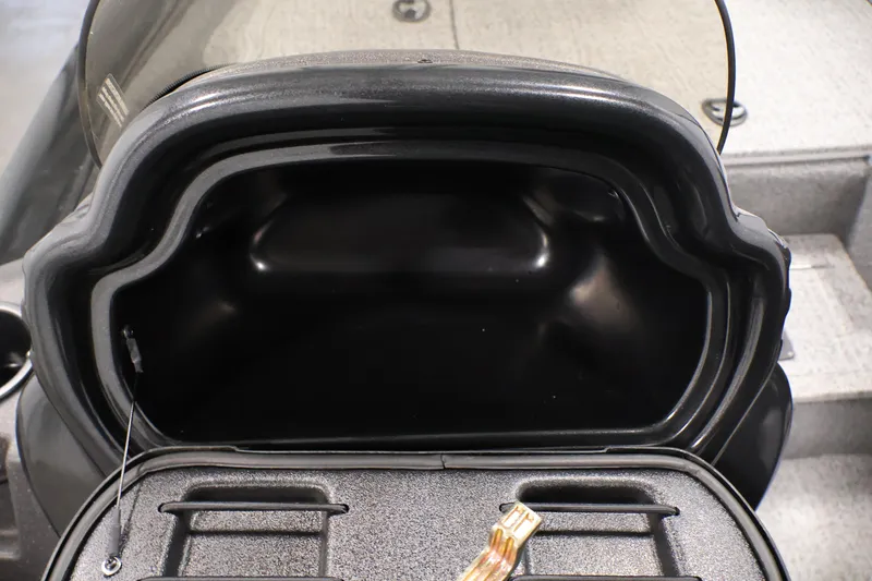 Slide: The Image of 2022 Tracker Pro Team 175 TXW storage compartment, open and empty, showcasing interior space. - 32